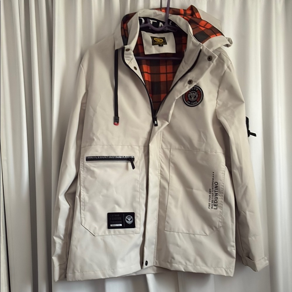 Stylish Beige Raincoat with Plaid Lining